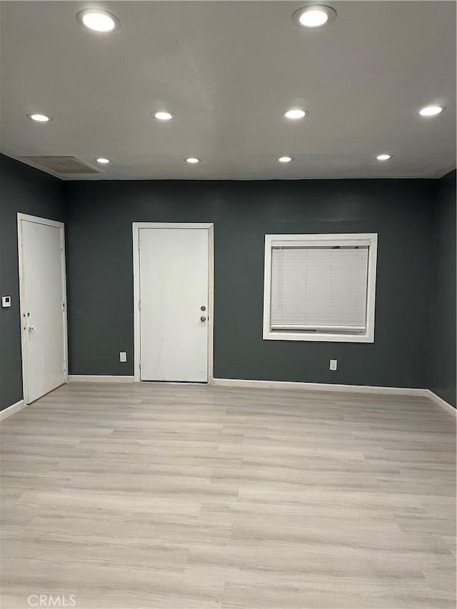 empty room featuring light hardwood / wood-style floors