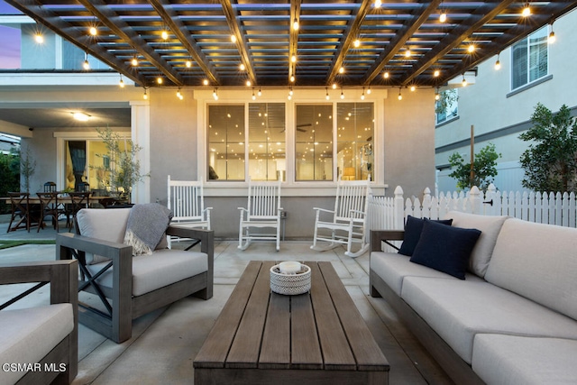 view of patio / terrace with an outdoor hangout area and a pergola