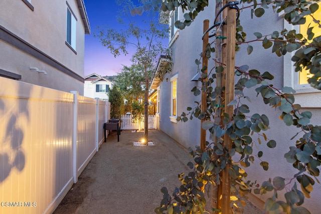 view of property exterior at dusk