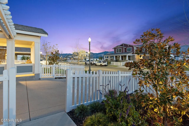 view of gate at dusk