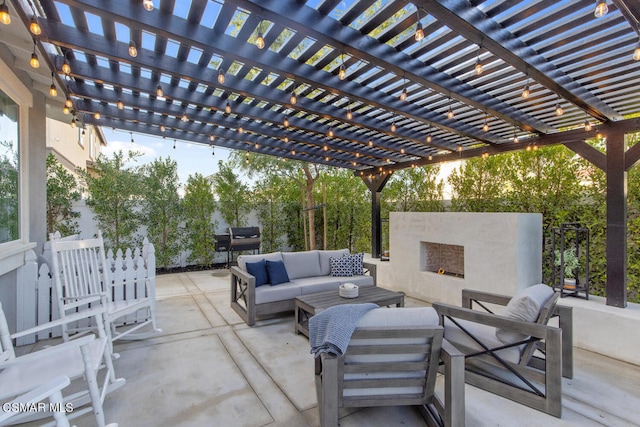 view of patio / terrace with a pergola and an outdoor living space