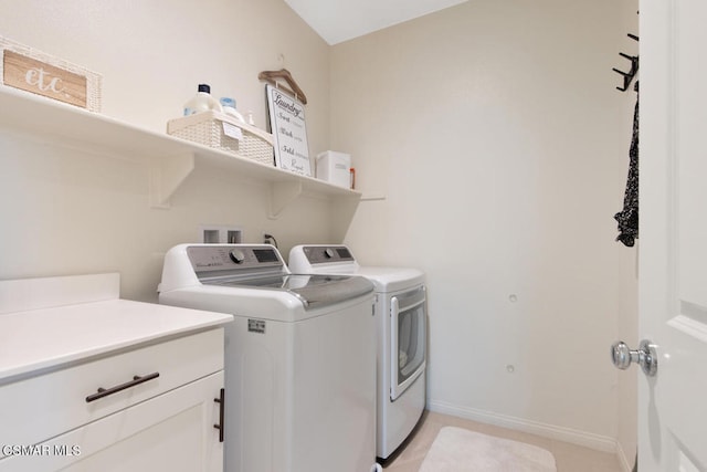 laundry room featuring washing machine and dryer