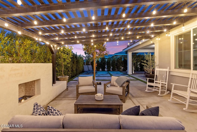 patio terrace at dusk featuring an outdoor living space and a pergola