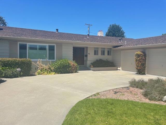 ranch-style home with a garage