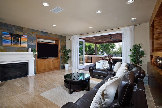 living room with ceiling fan