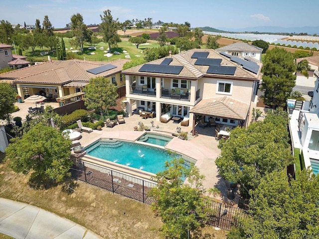 view of pool featuring an in ground hot tub and a patio area