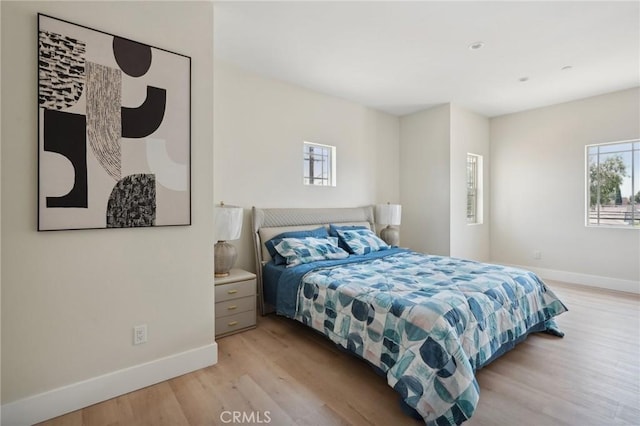 bedroom featuring light hardwood / wood-style flooring