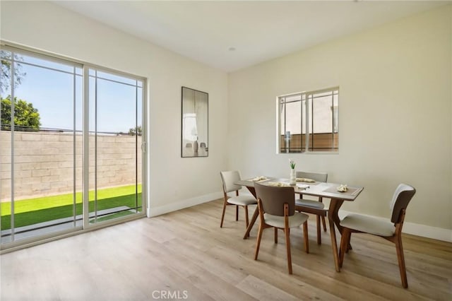 dining room featuring light wood-type flooring