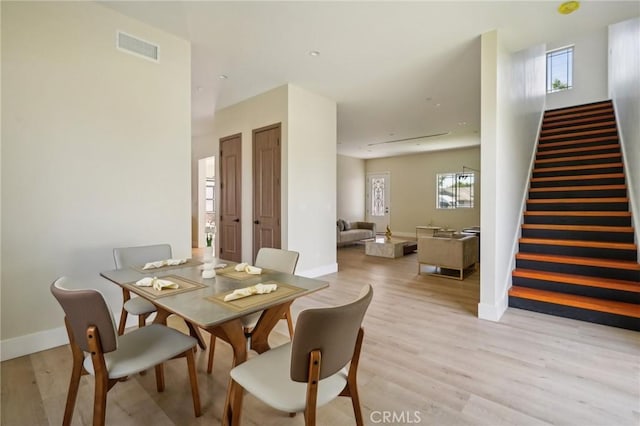 dining room featuring light hardwood / wood-style floors