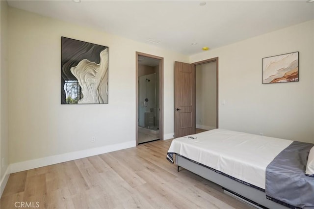 bedroom featuring light wood-type flooring