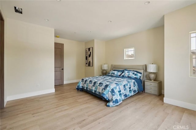 bedroom featuring light wood-type flooring