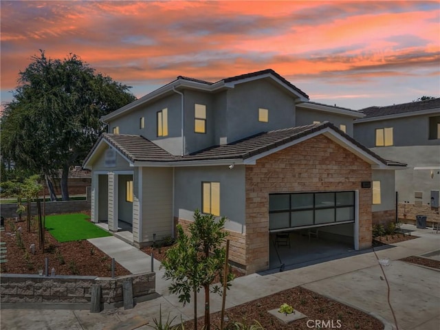 view of front of property with a garage