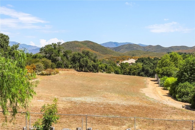 property view of mountains featuring a rural view