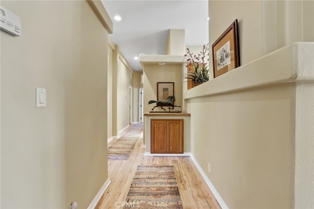 hall featuring light hardwood / wood-style floors