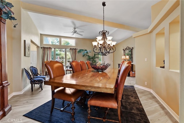 dining area with beamed ceiling, light hardwood / wood-style flooring, and ceiling fan with notable chandelier