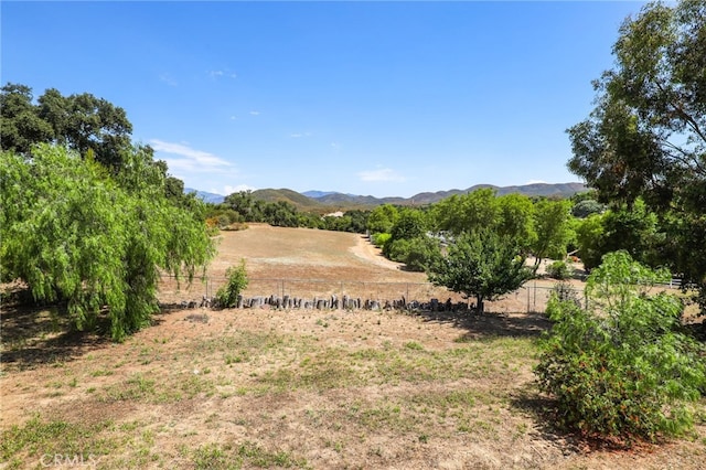 view of mountain feature featuring a rural view