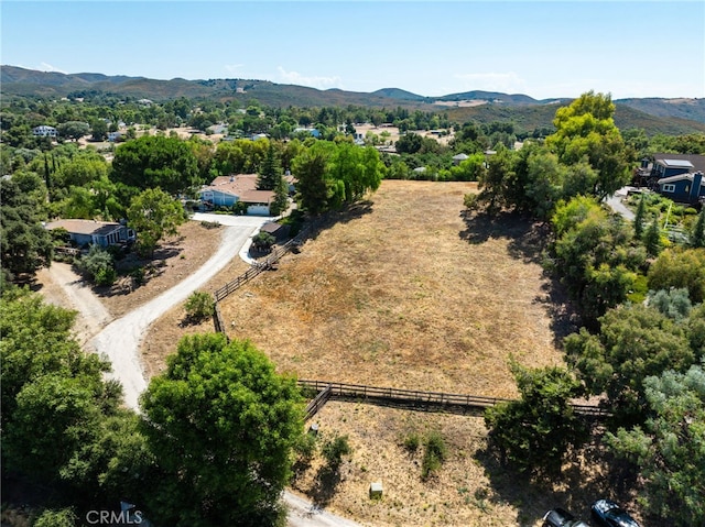 drone / aerial view featuring a mountain view