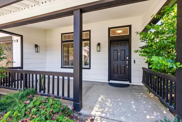 entrance to property with covered porch