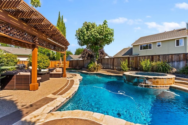 view of swimming pool with a patio area, an outdoor living space, pool water feature, and an in ground hot tub