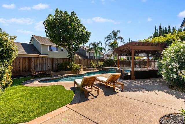 view of pool with a patio area, a lawn, and a pergola