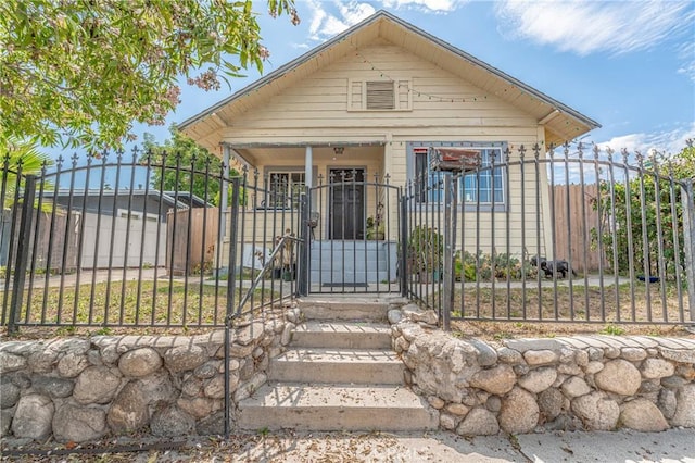 bungalow-style home with covered porch