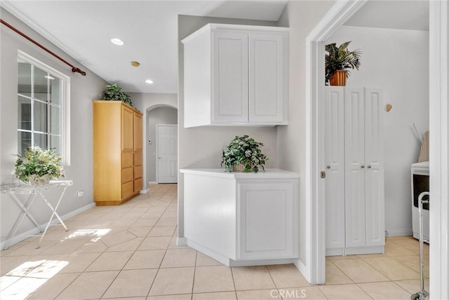 interior space with light tile patterned flooring