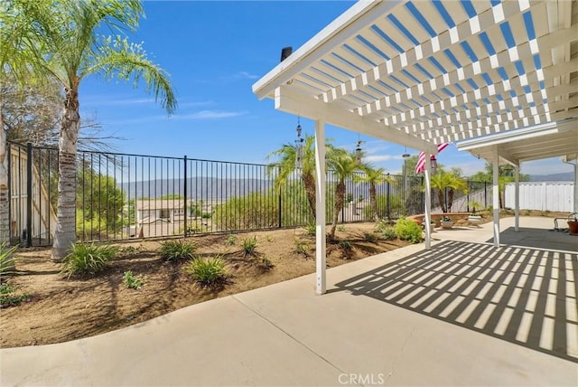 view of patio featuring a pergola