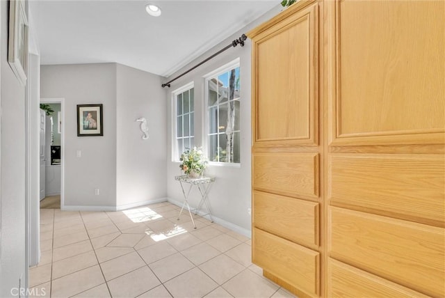 interior space featuring light tile patterned flooring