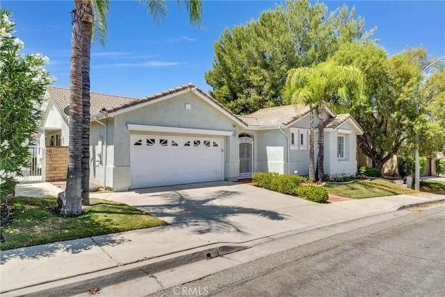 ranch-style house featuring a garage