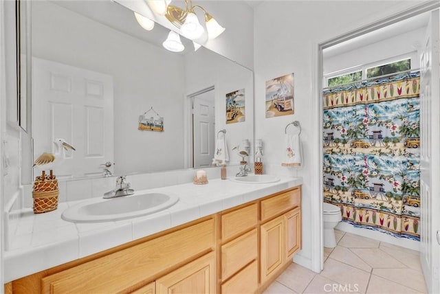 bathroom featuring tile patterned floors, vanity, toilet, and a shower with curtain