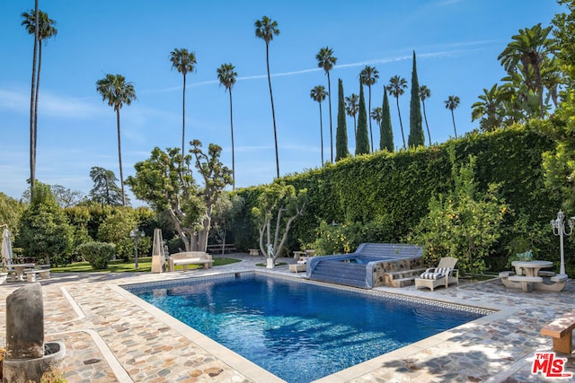 view of pool with a patio area