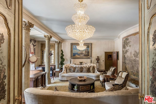 interior space featuring ornamental molding, a chandelier, and ornate columns