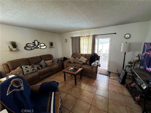 tiled living room with a textured ceiling