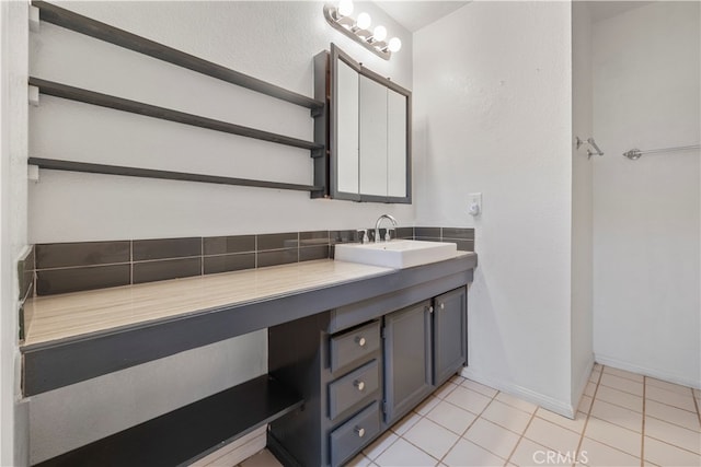 bathroom with vanity and tile patterned floors