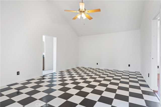 unfurnished room with high vaulted ceiling and ceiling fan