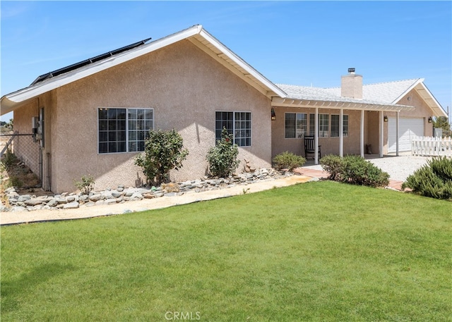 view of front of home with a front lawn