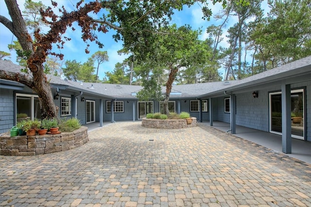 rear view of house with a patio area