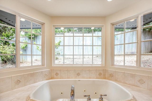 bathroom with tiled tub