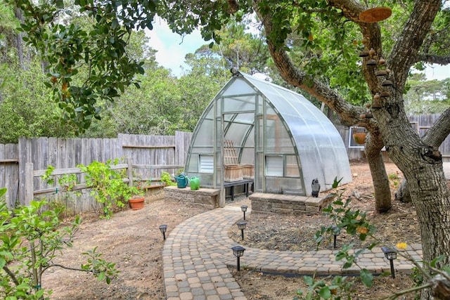 view of patio featuring an outdoor structure