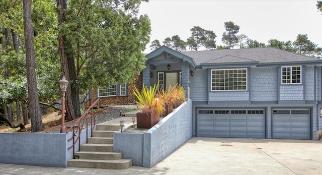 view of front of home with a garage