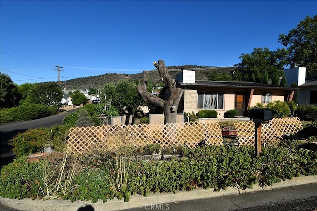 view of front of home with a chimney