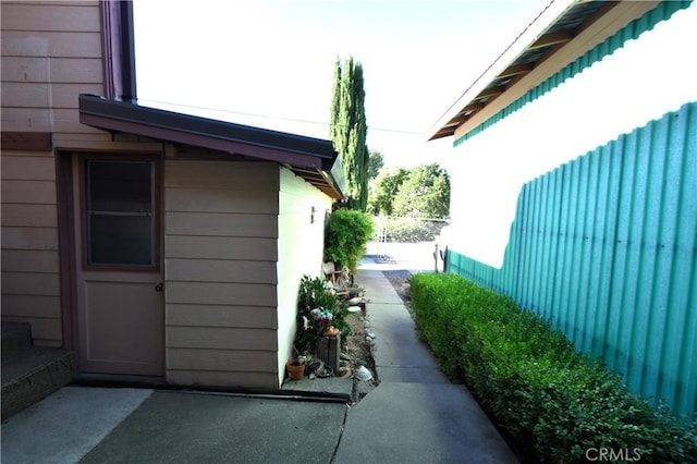 view of property exterior featuring fence