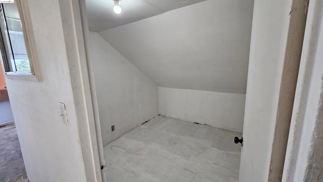 bonus room featuring vaulted ceiling