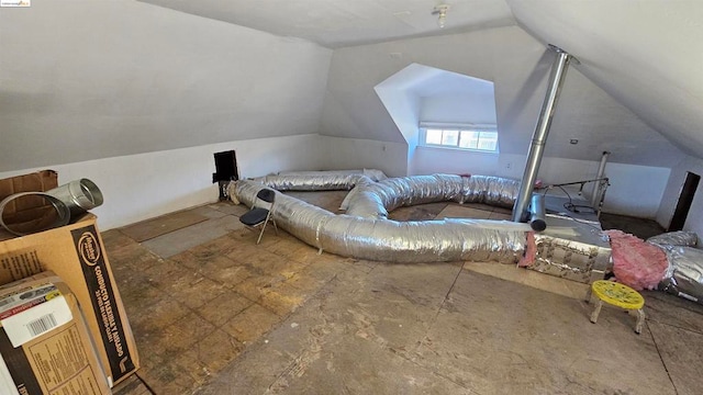 bedroom featuring lofted ceiling