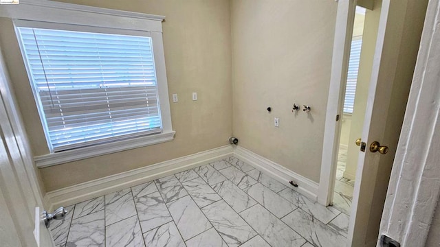 laundry room featuring hookup for a washing machine and electric dryer hookup