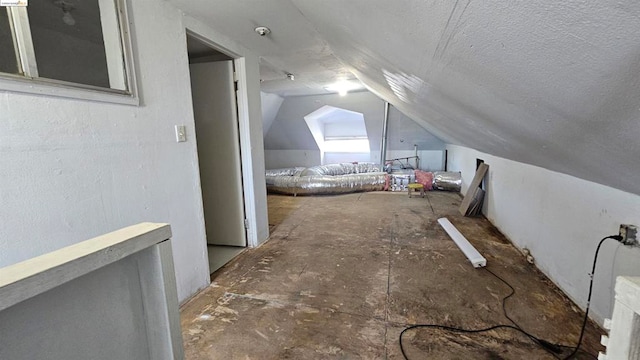 bonus room with vaulted ceiling