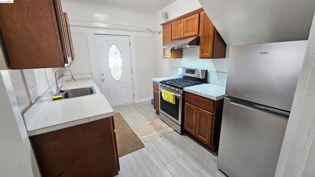 kitchen featuring appliances with stainless steel finishes and sink