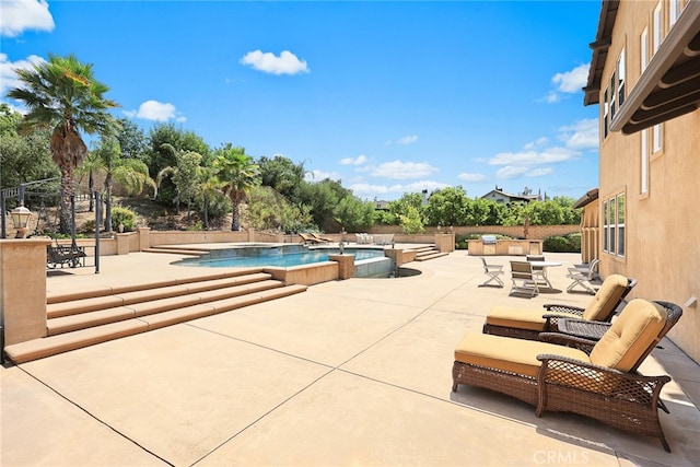 view of pool with a patio