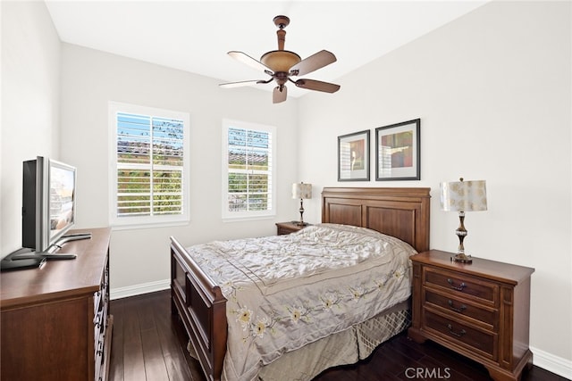 bedroom featuring dark hardwood / wood-style floors and ceiling fan