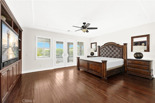 bedroom with access to outside, french doors, dark wood-type flooring, and ceiling fan